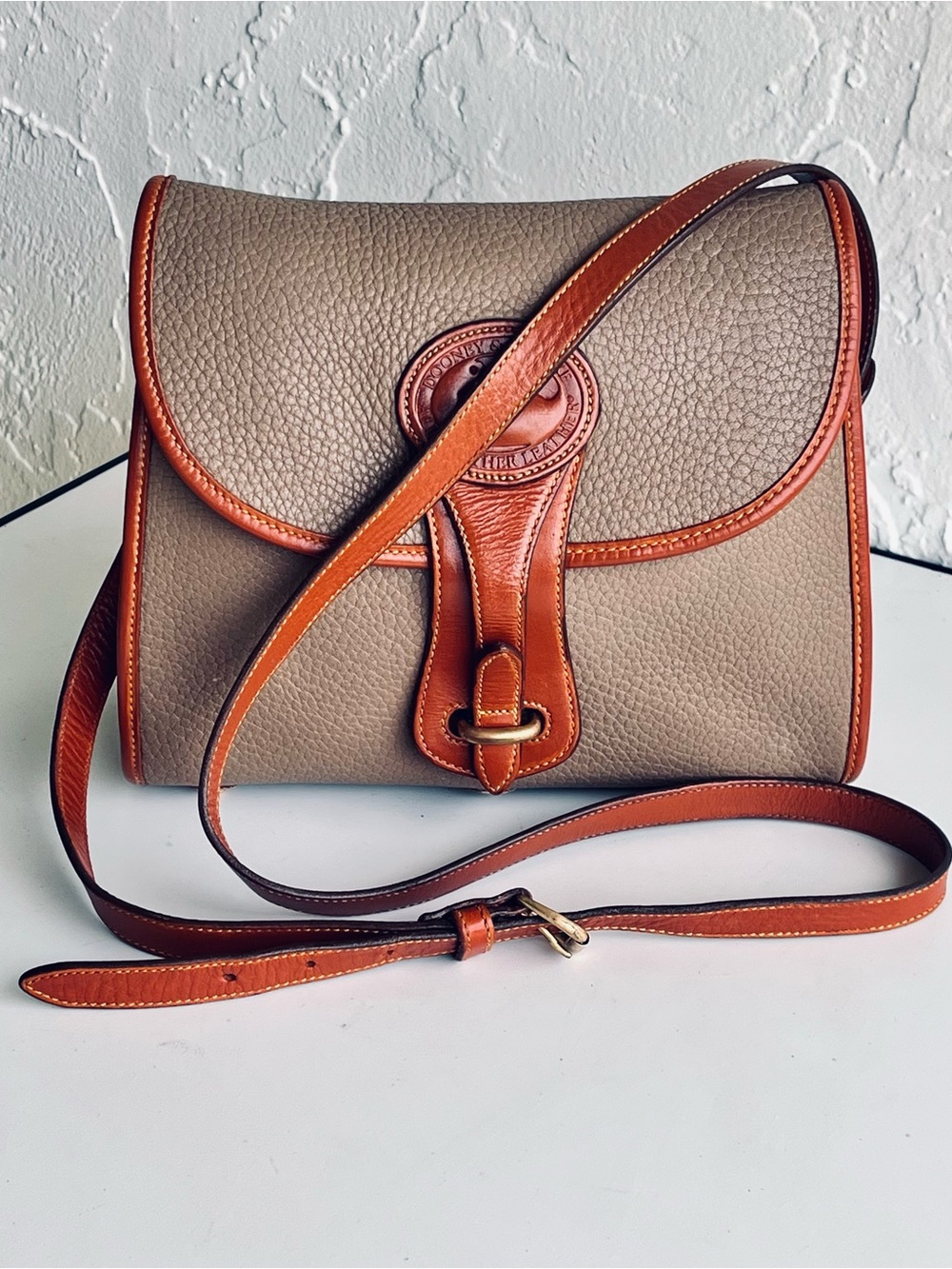 VINTAGE DOONEY AND BOURKE  SMALL SAND/KHAKI TAN TRIM ESSEX AWL CROSSBODY BAG